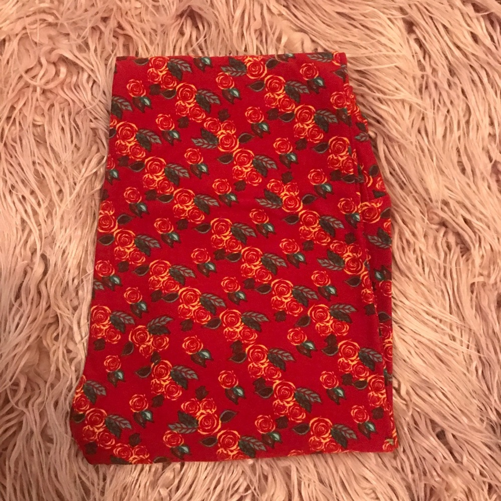 Lularoe one size os rose print leggings never worn